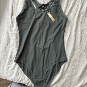 Skims sport utility bodysuit with open back